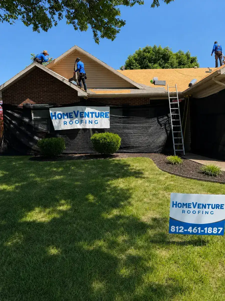 HomeVenture Roofing crew installing a new roof on an Evansville home.